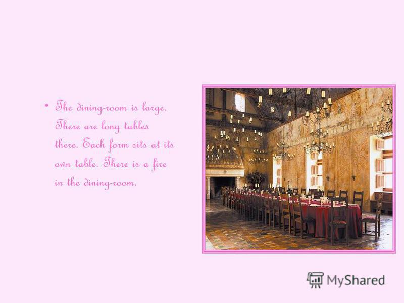 The dining-room is large. There are long tables there. Each form sits at its own table. There is a fire in the dining-room.