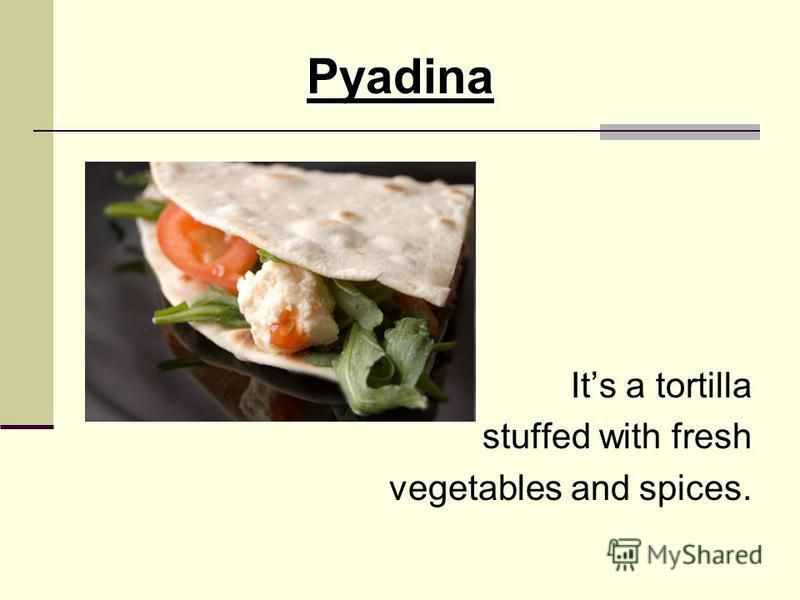 Pyadina Its a tortilla stuffed with fresh vegetables and spices.